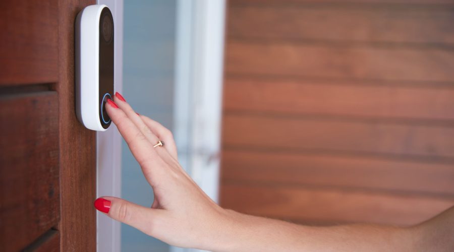 close-up-of-woman-ringing-front-doorbell-equipped-2021-08-29-04-06-56-utc (1)